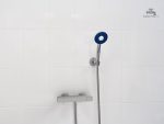 Pommeau de douche supporté par ventouse
